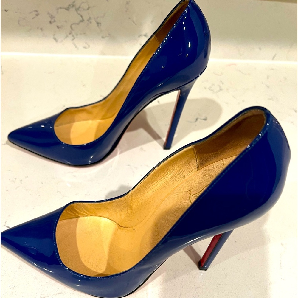 Gently used navy blue Christian Louboutin pumps